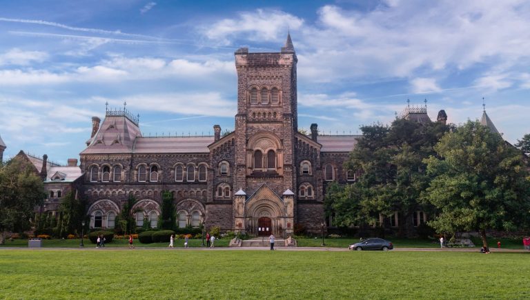A university building in Canada surrounded by vast green spaces