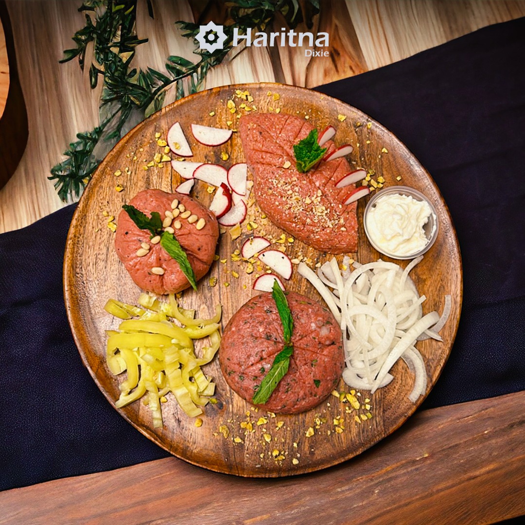 Preparing a meat meal on a wooden board with delicious onion slices
