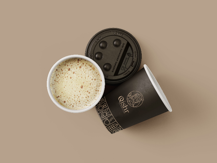 Overhead view of a coffee cup at Qishr Coffee House